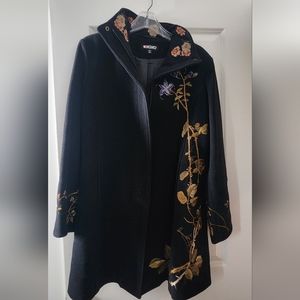 Black wool, cashmere, lamb blend with zipper knee length coat.